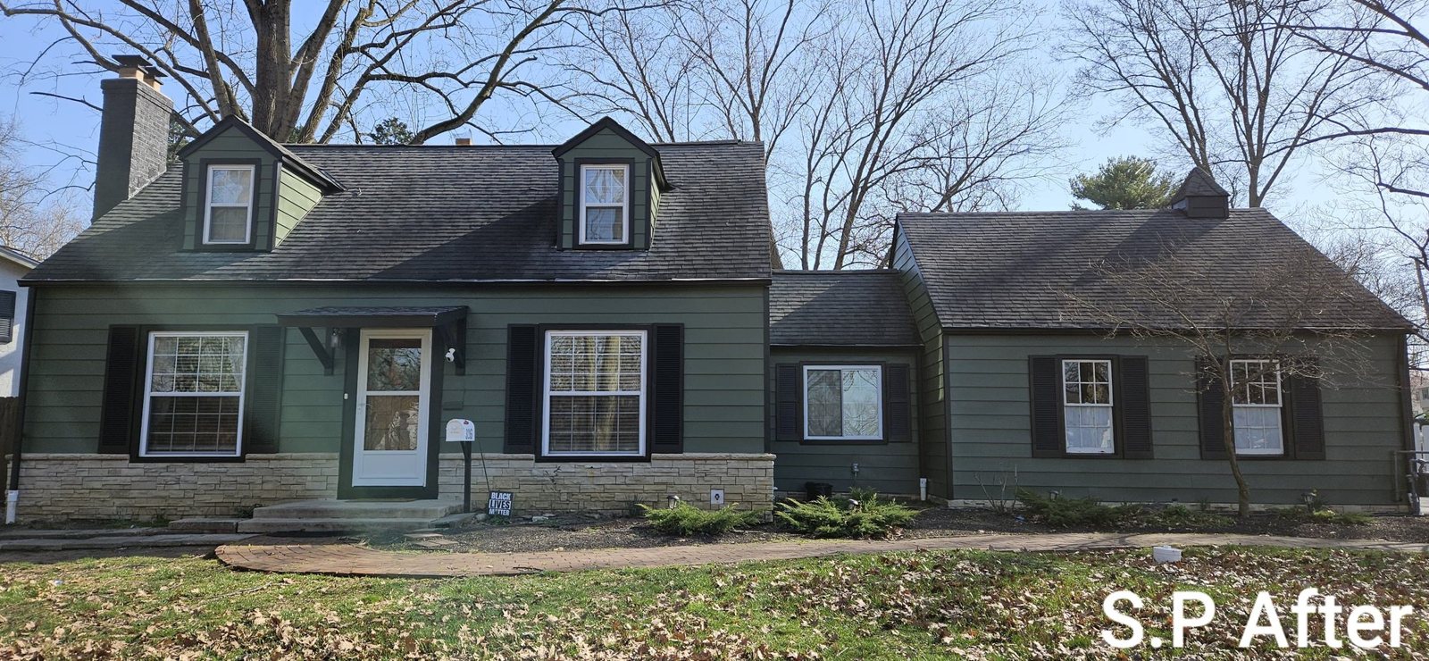 Cape cod house exterior painted green after — Segor Painting, Columbus OH